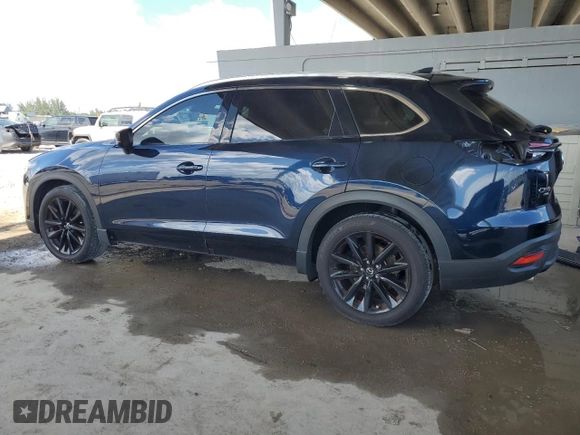 2022 Mazda CX-9 Touring Plus with VIN JM3TCBAYXN0607056, listed as a Copart auction lot 61740065 with 59,281 mi miles and Salvage title. Bid and sale history available at DreamBid. Image 2.