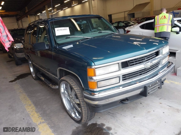 1997 Chevrolet Tahoe with VIN 1GNEK13R8VJ411512, listed as a IAAI auction lot 41583085 with 239,481 mi miles. Bid and sale history available at carsss.com. Image 1.