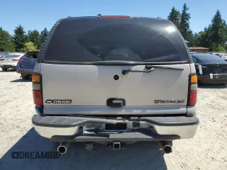 2004 Chevrolet Tahoe LS with VIN 1GNEC13V24J321605, listed as a Copart auction lot 64476065 with 176,551 mi miles and Salvage title. Bid and sale history available at DreamBid. Image 6.