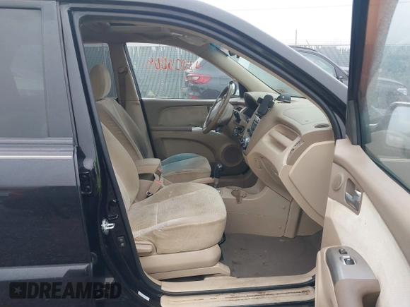2008 Kia Sportage LX with VIN KNDJE723987527110, listed as a IAAI auction lot 42020008 with 197,810 mi miles and . Bid and sale history available at DreamBid. Image 5.