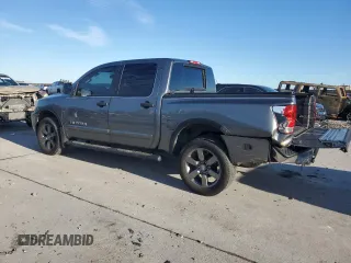 2015 Nissan Titan SL with VIN 1N6AA0EC6FN512486, listed as a Copart auction lot 88996665 with 91,569 mi miles and Salvage Title. Bid and sale history available at carsss.com. Image 2.