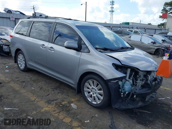 2011 Toyota Sienna XLE AAS with VIN 5TDYK3DC8BS157794, listed as a IAAI auction lot 40759823 with 211,716 mi miles and . Bid and sale history available at DreamBid. Image 1.