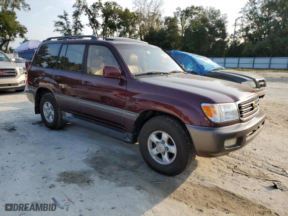 2000 Toyota Land Cruiser with VIN JT3HT05J9Y0111707, listed as a Copart auction lot 76317924 with 338,374 mi miles and Salvage Title. Bid and sale history available at carsss.com. Image 4.