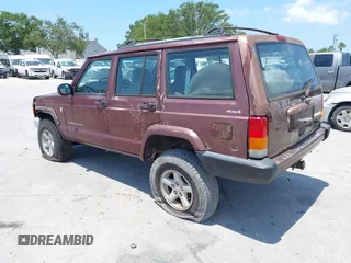2000 Jeep Cherokee z VIN 1J4FF48S7YL129654, wystawiony jako IAAI lot #42201026 z przebiegiem 272 922 mil mil oraz . Historia ofert i sprzedaży dostępna na DreamBid. Obrazek 3.