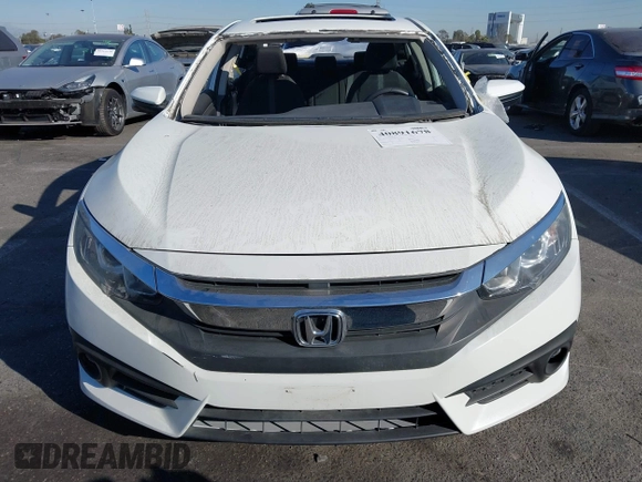 2017 Honda Civic EX-T with VIN 19XFC1E38HE002205, listed as a IAAI auction lot 40891678 with 10,398 mi miles and . Bid and sale history available at DreamBid. Image 12.