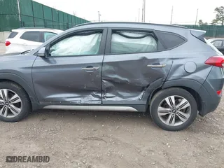 2017 Hyundai Tucson Value with VIN KM8J33A21HU359113, listed as a IAAI auction lot 41897638 with 80,010 mi miles. Bid and sale history available at carsss.com. Image 6.