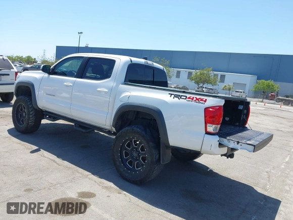 2017 Toyota Tacoma SR5 z VIN 3TMCZ5AN7HM095515, wystawiony jako IAAI lot #42150909 z przebiegiem 70 603 mil mil oraz . Historia ofert i sprzedaży dostępna na DreamBid. Obrazek 3.