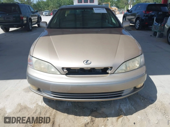 1999 Lexus ES 300 Luxury Sport Sdn with VIN JT8BF28G0X5065317, listed as a IAAI auction lot 42080216 with 163,223 mi miles. Bid and sale history available at carsss.com. Image 6.