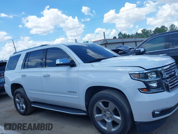2020 Chevrolet Tahoe LTZ with VIN 1GNSCCKCXLR215899, listed as a IAAI auction lot 40128171 with 109,541 mi miles and . Bid and sale history available at DreamBid. Image 13.