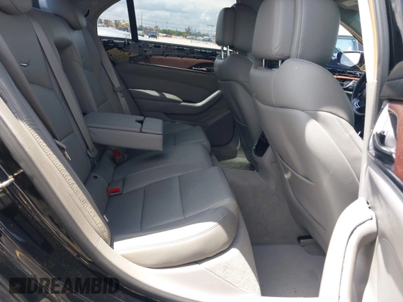 2014 Cadillac CTS RWD with VIN 1G6AP5SX0E0185913, listed as a IAAI auction lot 42685622 with 107,406 mi miles and . Bid and sale history available at DreamBid. Image 8.