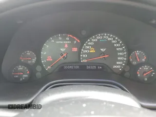 2002 Chevrolet Corvette with VIN 1G1YY32G325123703, listed as a Copart auction lot 77258804 with 26,325 mi miles and Salvage Title. Bid and sale history available at carsss.com. Image 9.