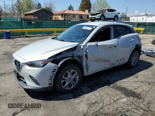 2018 Mazda CX-3 Sport z VIN JM1DKFB74J0328404, wystawiony jako Copart lot #56248215 z przebiegiem 79 444 mil mil oraz Szkoda całkowita • Salvage title. Historia ofert i sprzedaży dostępna na DreamBid. Obrazek 1.