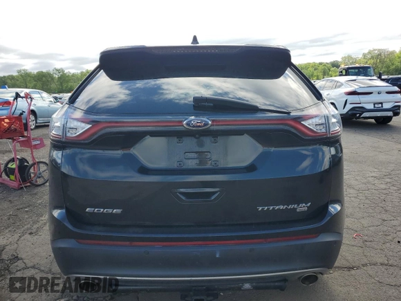 2015 Ford Edge Titanium z VIN 2FMTK4K86FBB88124, wystawiony jako Copart lot #57392305 z przebiegiem 95 698 mil mil oraz Szkoda całkowita • Salvage title. Historia ofert i sprzedaży dostępna na DreamBid. Obrazek 6.