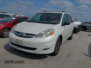 2006 Toyota Sienna XLE with VIN 5TDZA22C76S575385, listed as a IAAI auction lot 42056654 with 259,649 mi miles. Bid and sale history available at carsss.com. Image 2.