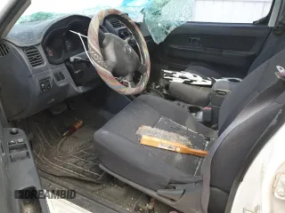 2002 Nissan Frontier XE z VIN 1N6ED29X12C348006, wystawiony jako Copart lot #41897905 z przebiegiem 91 363 mil mil oraz Szkoda całkowita • Salvage title. Historia ofert i sprzedaży dostępna na DreamBid. Obrazek 7.