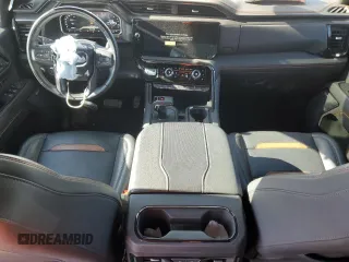 2023 GMC Sierra 1500 AT4 with VIN 3GTUUEE81PG231674, listed as a Copart auction lot 44615465 with 35,569 mi miles and Salvage title. Bid and sale history available at DreamBid. Image 8.
