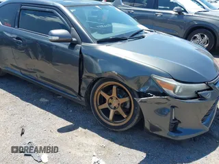 2014 Scion tC z VIN JTKJF5C72E3069389, wystawiony jako IAAI lot #42309410 z przebiegiem 148 494 mil mil oraz . Historia ofert i sprzedaży dostępna na DreamBid. Obrazek 6.
