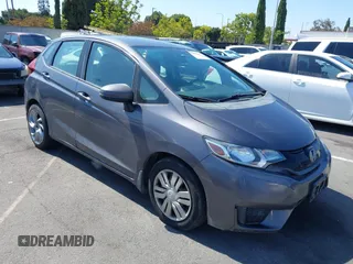 2015 Honda Fit LX with VIN 3HGGK5G54FM731965, listed as a IAAI auction lot 42655355 with 141,205 mi miles and . Bid and sale history available at DreamBid. Image 1.