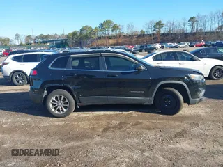 2019 Jeep Cherokee Latitude Plus with VIN 1C4PJMLB2KD261304, listed as a IAAI auction lot 41877500 with 76,442 mi miles and . Bid and sale history available at DreamBid. Image 13.