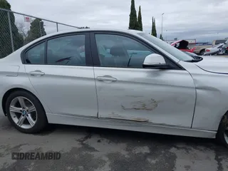 2015 BMW 3 Series 320i with VIN WBA3B1C5XFK137171, listed as a IAAI auction lot 41736278 with 28,673 mi miles. Bid and sale history available at carsss.com. Image 13.