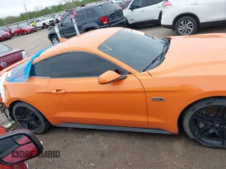 2021 Ford Mustang EcoBoost with VIN 1FA6P8TD5M5151336, listed as a IAAI auction lot 41916198 with 58,990 mi miles and . Bid and sale history available at DreamBid. Image 14.