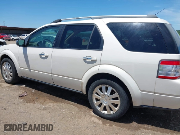 2009 Ford Taurus X Limited z VIN 1FMDK03W99GA03698, wystawiony jako IAAI lot #42243428 z przebiegiem 158 551 mil mil oraz . Historia ofert i sprzedaży dostępna na DreamBid. Obrazek 14.