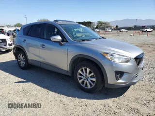 2015 Mazda CX-5 Touring with VIN JM3KE2CY5F0483492, listed as a Copart auction lot 48426065 with 158,749 mi miles and Salvage Title. Bid and sale history available at carsss.com. Image 4.