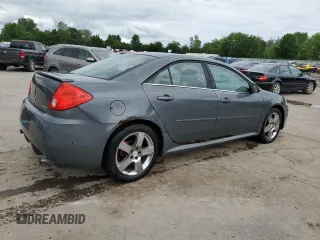 2009 Pontiac G6 GXP 1SA with VIN 1G2ZM577294217264, listed as a Copart auction lot 63824735 with 165,948 mi miles and Salvage title. Bid and sale history available at DreamBid. Image 3.