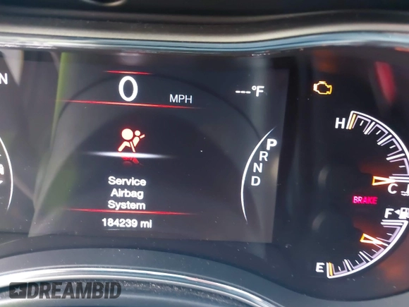 2017 Jeep Grand Cherokee Laredo with VIN 1C4RJEAG1HC720656, listed as a IAAI auction lot 42263500 with 184,239 mi miles and . Bid and sale history available at DreamBid. Image 7.