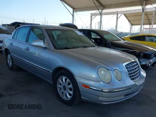 2004 Kia Amanti z VIN KNALD124X45033763, wystawiony jako IAAI lot #42229204 z przebiegiem 185 132 mil mil oraz . Historia ofert i sprzedaży dostępna na DreamBid. Obrazek 1.