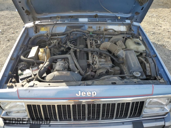 1991 Jeep Cherokee with VIN 1J4FJ58S1ML520376, listed as a Copart auction lot 75452364 with 147,982 mi miles and Salvage title. Bid and sale history available at DreamBid. Image 12.