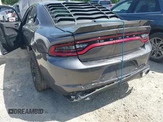 2018 Dodge Charger Daytona z VIN 2C3CDXCT4JH261021, wystawiony jako IAAI lot #42188904 z przebiegiem 79 652 mil mil oraz . Historia ofert i sprzedaży dostępna na DreamBid. Obrazek 6.
