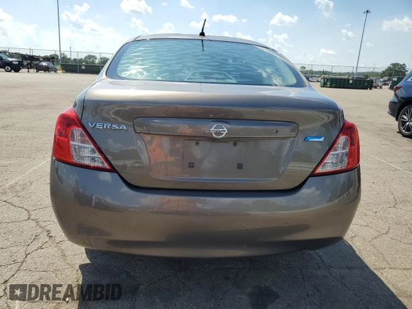 2012 Nissan Versa SV with VIN 3N1CN7AP7CL930619, listed as a Copart auction lot 63657855 with 106,911 mi miles and Salvage title. Bid and sale history available at DreamBid. Image 6.