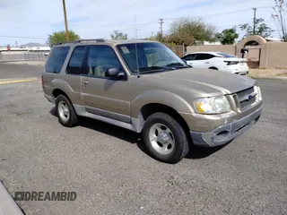2003 Ford Explorer Sport XLS z VIN 1FMYU60E13UA37301, wystawiony jako Copart lot #51471075 z przebiegiem 234 572 mil mil oraz Tytuł czysty. Historia ofert i sprzedaży dostępna na DreamBid. Obrazek 1.