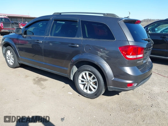 2014 Dodge Journey SXT with VIN 3C4PDCBG6ET192288, listed as a IAAI auction lot 41787594 with 132,973 mi miles. Bid and sale history available at carsss.com. Image 3.