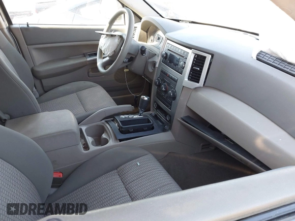 2008 Jeep Grand Cherokee Laredo with VIN 1J8GR48K28C169859, listed as a IAAI auction lot 41965149 with 166,069 mi miles. Bid and sale history available at carsss.com. Image 5.