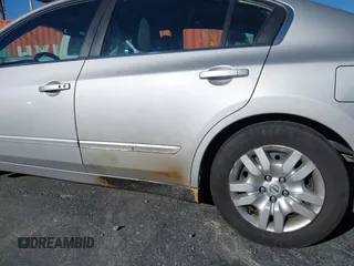 2011 Nissan Altima S with VIN 1N4AL2AP0BN487408, listed as a IAAI auction lot 41675403 with 184,476 mi miles and . Bid and sale history available at DreamBid. Image 6.
