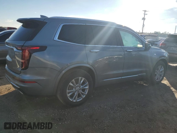 2023 Cadillac XT6 FWD Luxury z VIN 1GYKPAR48PZ115719, wystawiony jako Copart lot #87848435 z przebiegiem 17 597 mil mil oraz Szkoda całkowita • Salvage title. Historia ofert i sprzedaży dostępna na DreamBid. Obrazek 3.