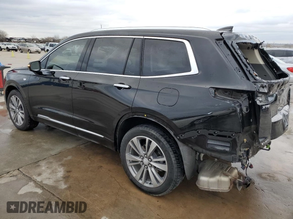 2021 Cadillac XT6 Premium Luxury z VIN 1GYKPCRS6MZ207546, wystawiony jako Copart lot #85995814 z przebiegiem 30 885 mil mil oraz Czysty tytuł • Clean title. Historia ofert i sprzedaży dostępna na DreamBid. Obrazek 2.