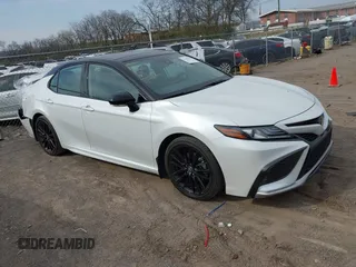 2022 Toyota Camry TRD with VIN 4T1KZ1AK2NU063990, listed as a IAAI auction lot 41790181 with 25,361 mi miles and . Bid and sale history available at DreamBid. Image 1.