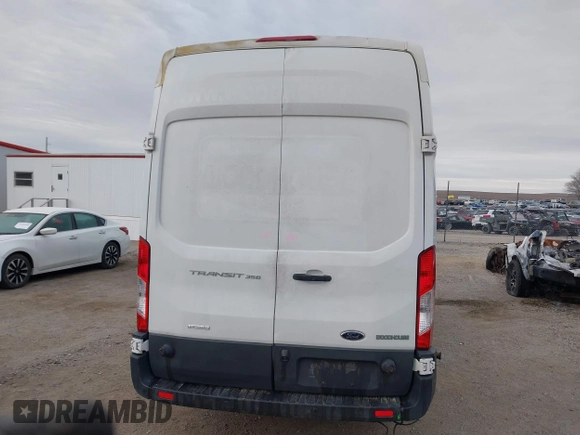 2017 Ford Transit Cargo with VIN 1FTBW3XG7HKA27501, listed as a IAAI auction lot 41420053 with 394,696 mi miles. Bid and sale history available at carsss.com. Image 17.