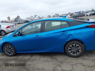 2020 Toyota Prius L Eco z VIN JTDKARFU9L3104395, wystawiony jako IAAI lot #42207156 z przebiegiem 85 572 mil mil oraz . Historia ofert i sprzedaży dostępna na DreamBid. Obrazek 14.