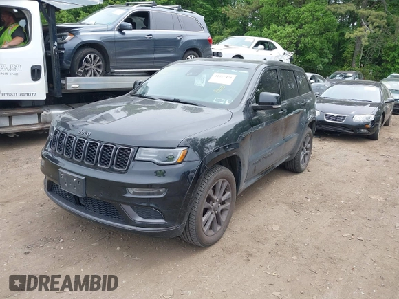 2019 Jeep Grand Cherokee High Altitude with VIN 1C4RJFCG6KC834369, listed as a IAAI auction lot 42327471 with 53,650 mi miles and . Bid and sale history available at DreamBid. Image 2.