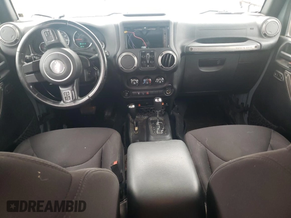 2015 Jeep Wrangler Unlimited Sport with VIN 1C4BJWDGXFL551284, listed as a Copart auction lot 56905935 with 155,988 mi miles and Salvage title. Bid and sale history available at DreamBid. Image 8.