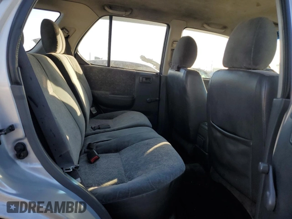 2000 Isuzu Rodeo S z VIN 4S2CK58W2Y4311726, wystawiony jako Copart lot #85070364 z przebiegiem 226 510 mil mil oraz Szkody całkowita. Historia ofert i sprzedaży dostępna na DreamBid. Obrazek 11.