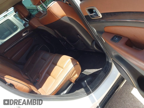 2015 Jeep Grand Cherokee Summit с VIN 1C4RJFJTXFC173287, выставлен на аукционе IAAI как лот 42794100 с пробегом 125 705 миль миль и . История ставок и продаж доступна на DreamBid. Изображение 8.