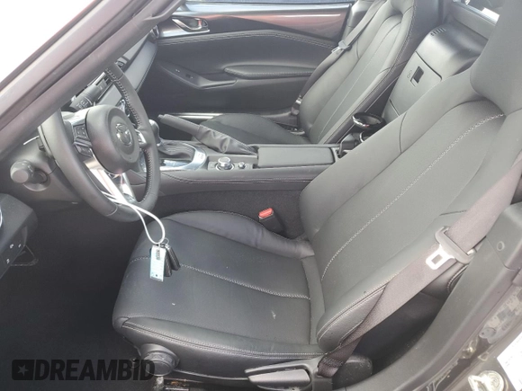 2024 Mazda MX-5 Miata Grand Touring z VIN JM1NDAM73R0603254, wystawiony jako Copart lot #74551704 z przebiegiem Nie podano mil oraz Nie do naprawy • Non repairable. Historia ofert i sprzedaży dostępna na DreamBid. Obrazek 7.