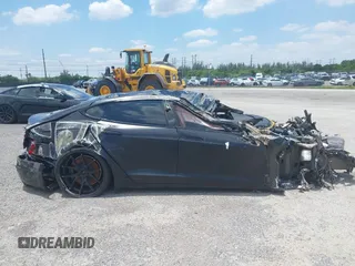 2021 Tesla Model S Plaid с VIN 5YJSA1E63MF451438, выставлен на аукционе IAAI как лот 41399777 с пробегом Не указан миль и . История ставок и продаж доступна на DreamBid. Изображение 12.