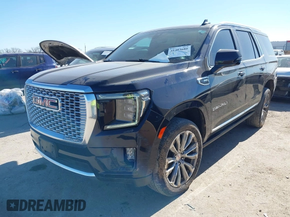 2021 GMC Yukon Denali with VIN 1GKS2DKL1MR135771, listed as a IAAI auction lot 41403680 with 61,772 mi miles. Bid and sale history available at carsss.com. Image 2.