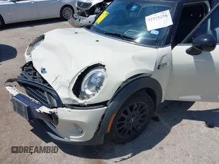 2016 MINI Hardtop 4 Door z VIN WMWXU1C50G2D08848, wystawiony jako IAAI lot #42215256 z przebiegiem 102 643 mil mil oraz . Historia ofert i sprzedaży dostępna na DreamBid. Obrazek 6.
